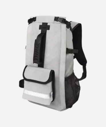 Grey dog backpack carrier with front pocket, mesh side panel and adjustable straps