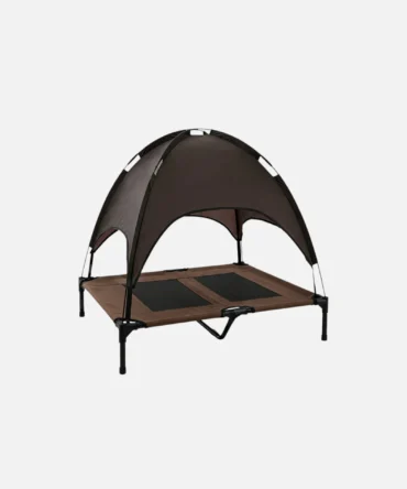 Outdoor elevated dog bed with canopy, brown breathable mesh platform, black metal frame, portable pet shade bed for camping and patio use