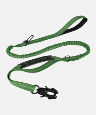 Green tactical rope dog leash with a padded handle, bungee section and metal clasp, displayed to show grip and flexibility
