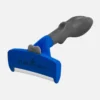Blue and grey dog deshedding tool against plain light background