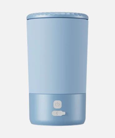 Blue portable dog paw cleaner product on white background